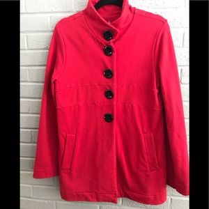 Women’s red button up jacket.